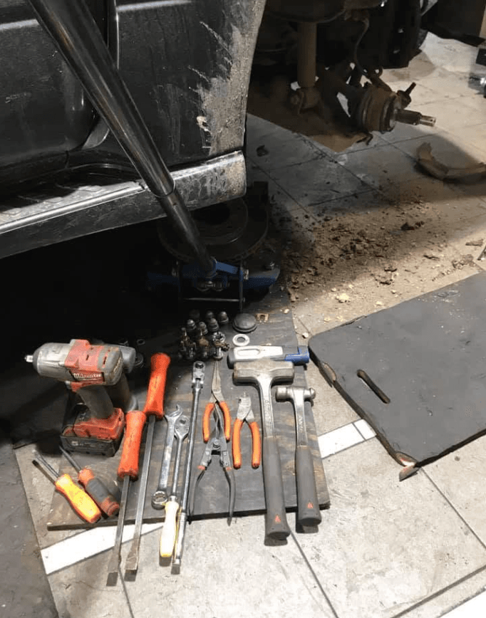 Mechanic working on a car
