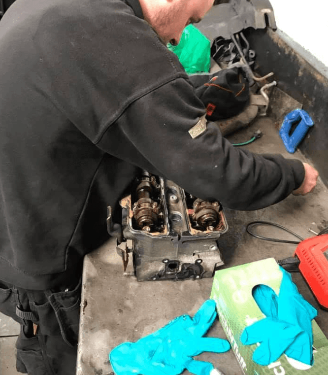 Mechanic working on a car