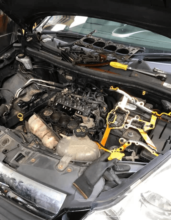 Mechanic working on a car