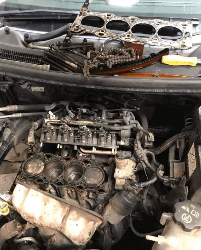 Mechanic working on a car